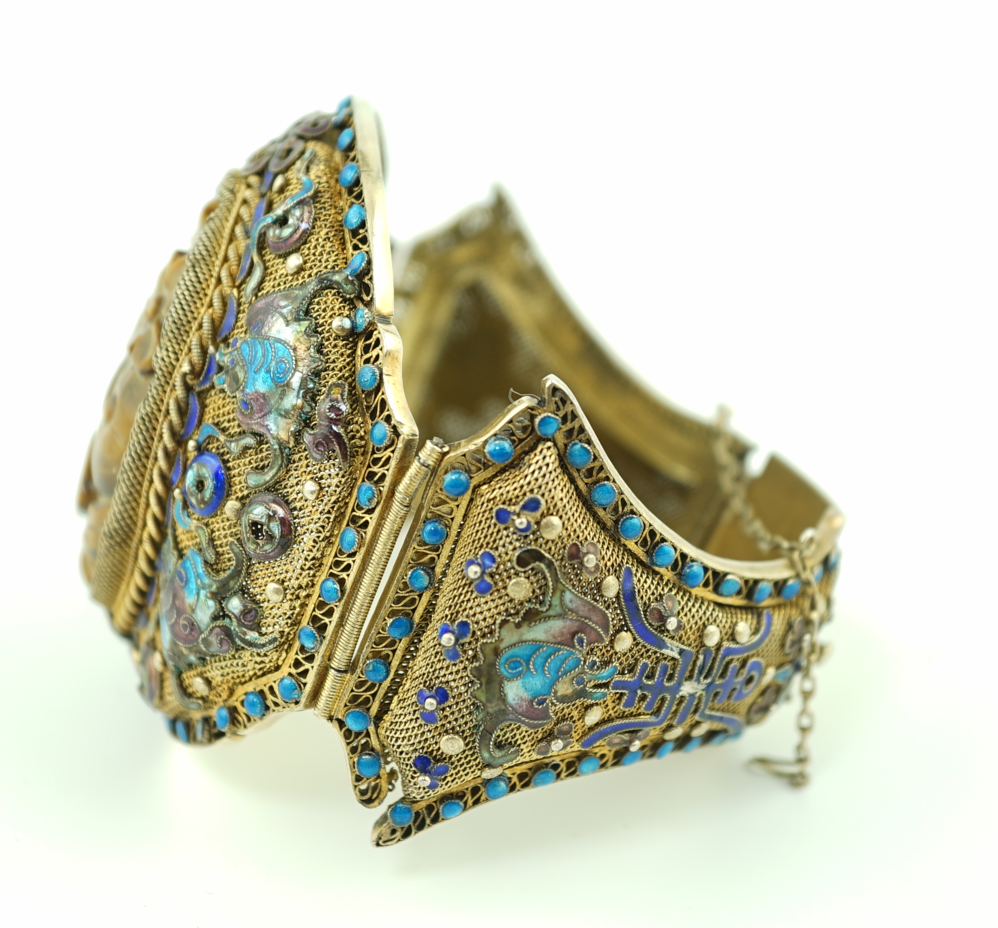 A Chinese silver-gilt, enamel and tiger's-eye bracelet, early 20th century